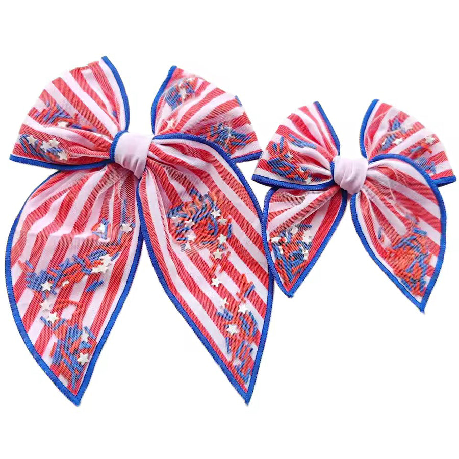 These patriotic stripes shaker pre-cut tied bows are ready to package and resell to your customers no sewing or measuring necessary! These hair bows come with a clip already attached. The shaker bows come pre-filled with patriotic stars and sprinkles clay mix.