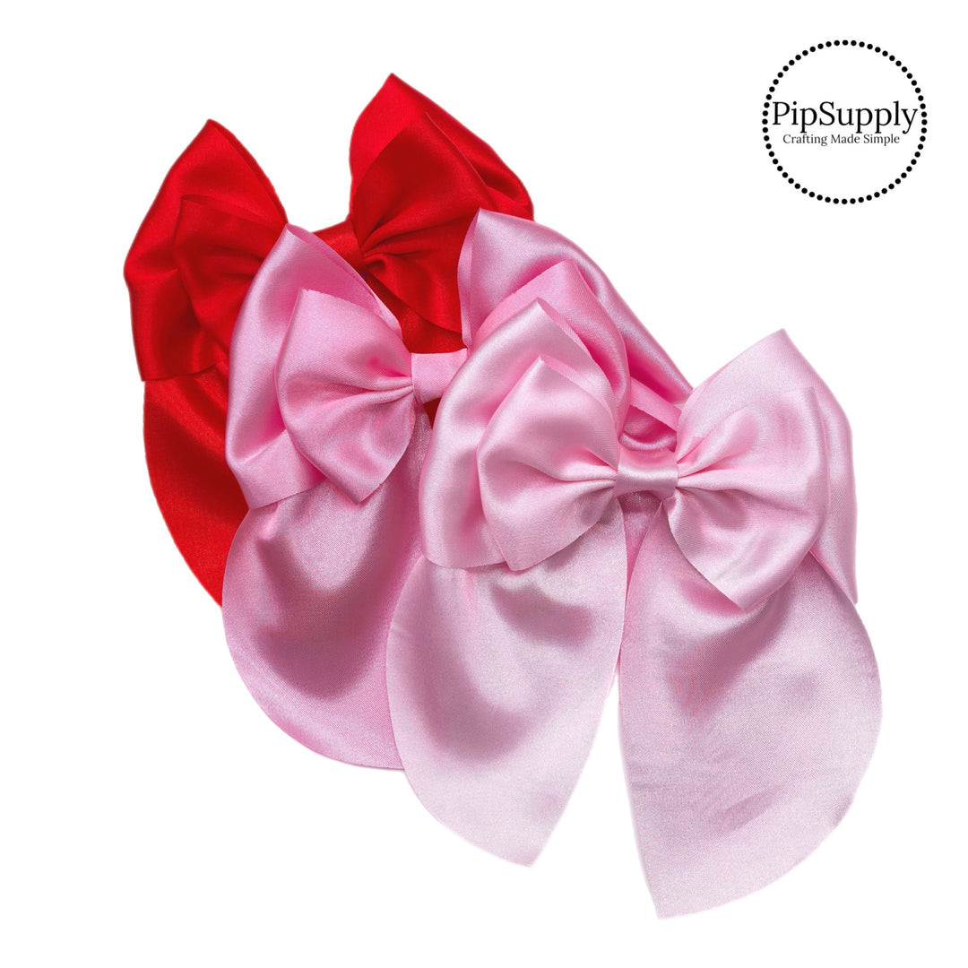 These solid satin pre-cut tied bows are ready to package and resell to your customers no sewing or measuring necessary! These hair bows come with a alligator clip already attached.