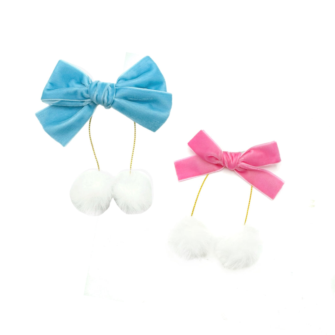 These Christmas velvet ribbon hair bow clips feature faux fur white pom poms. These bow clips can be used as piggie hair clips and are a stylish hair accessory and can be worn as they are. These hair clips are ready to wear or to sell to others.