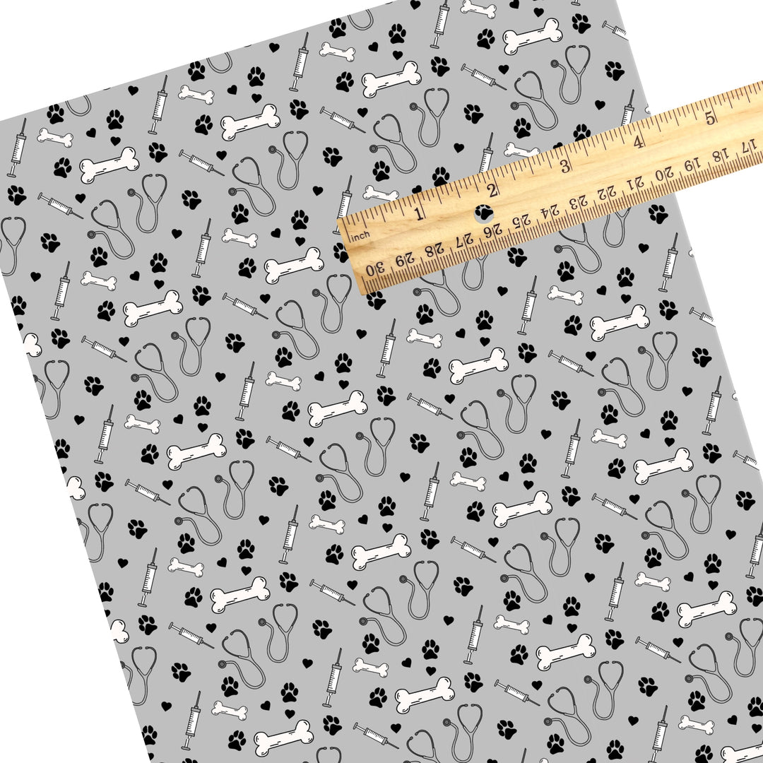 These veterinarian themed faux leather sheets contain the following design elements: stethoscopes, needles, and paw prints. Our CPSIA compliant faux leather sheets or rolls can be used for all types of crafting projects.