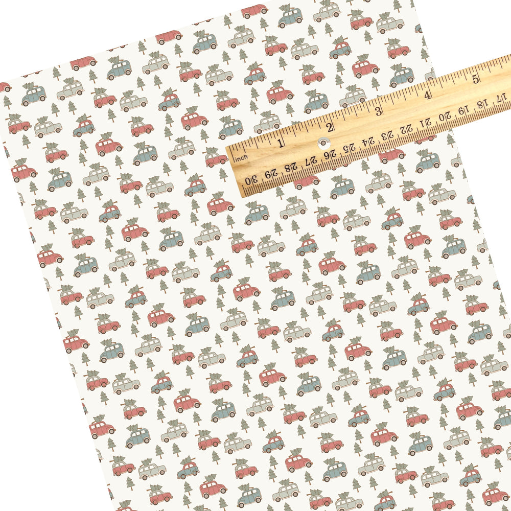 These Christmas themed pattern faux leather sheets contain the following design elements: vintage trucks carrying Christmas trees on cream. Our CPSIA compliant faux leather sheets or rolls can be used for all types of crafting projects.