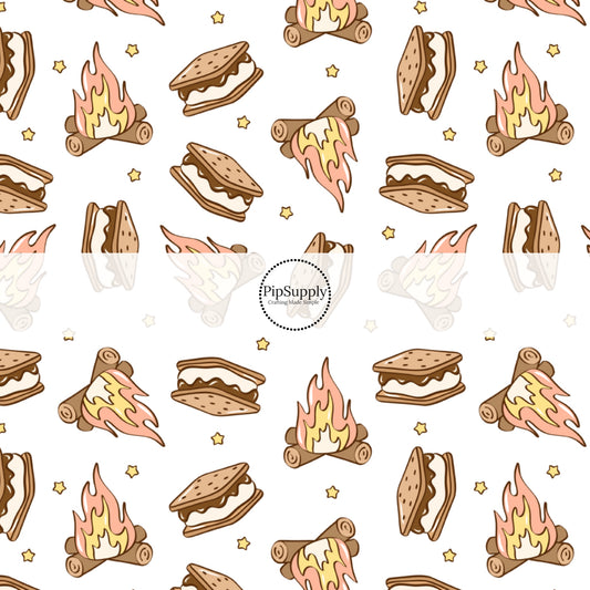 This summer fabric by the yard features smores around the fire. This fun summer themed fabric can be used for all your sewing and crafting needs! The designer of this pattern is Julie Storie Designs.