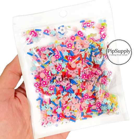 Flowers, red and blue sprinkles, diamonds, and dots clay slice mix