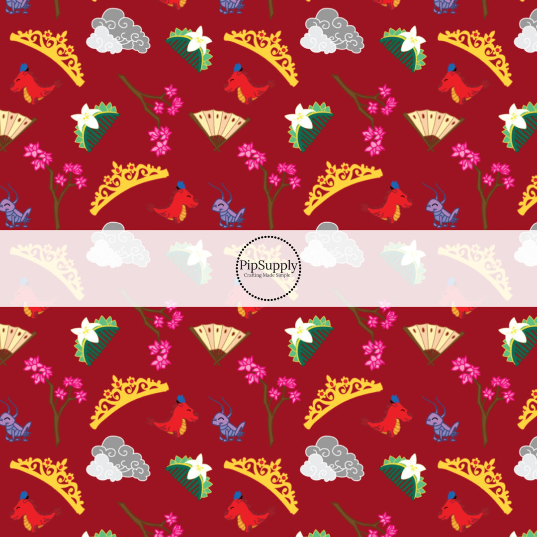 This magical adventure inspired fabric by the yard features the following design: princess crowns, dragons, and flowers on red. This fun themed fabric can be used for all your sewing and crafting needs!