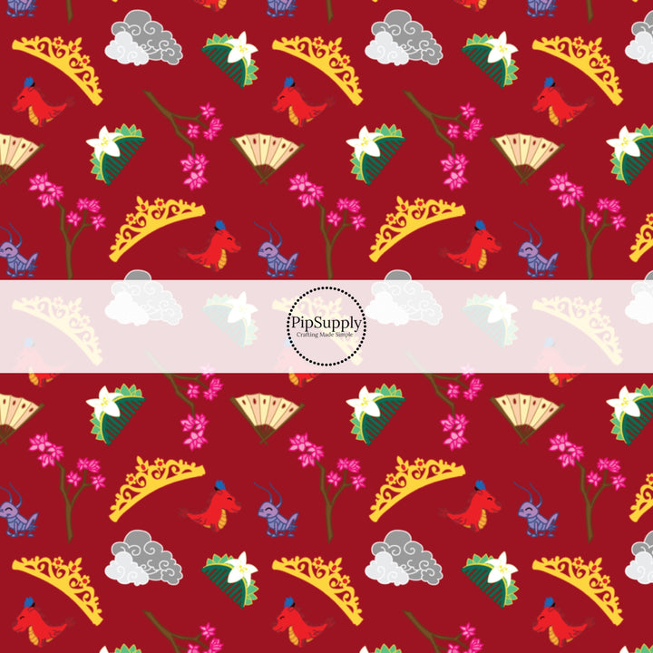 This magical adventure inspired fabric by the yard features the following design: princess crowns, dragons, and flowers on red. This fun themed fabric can be used for all your sewing and crafting needs!