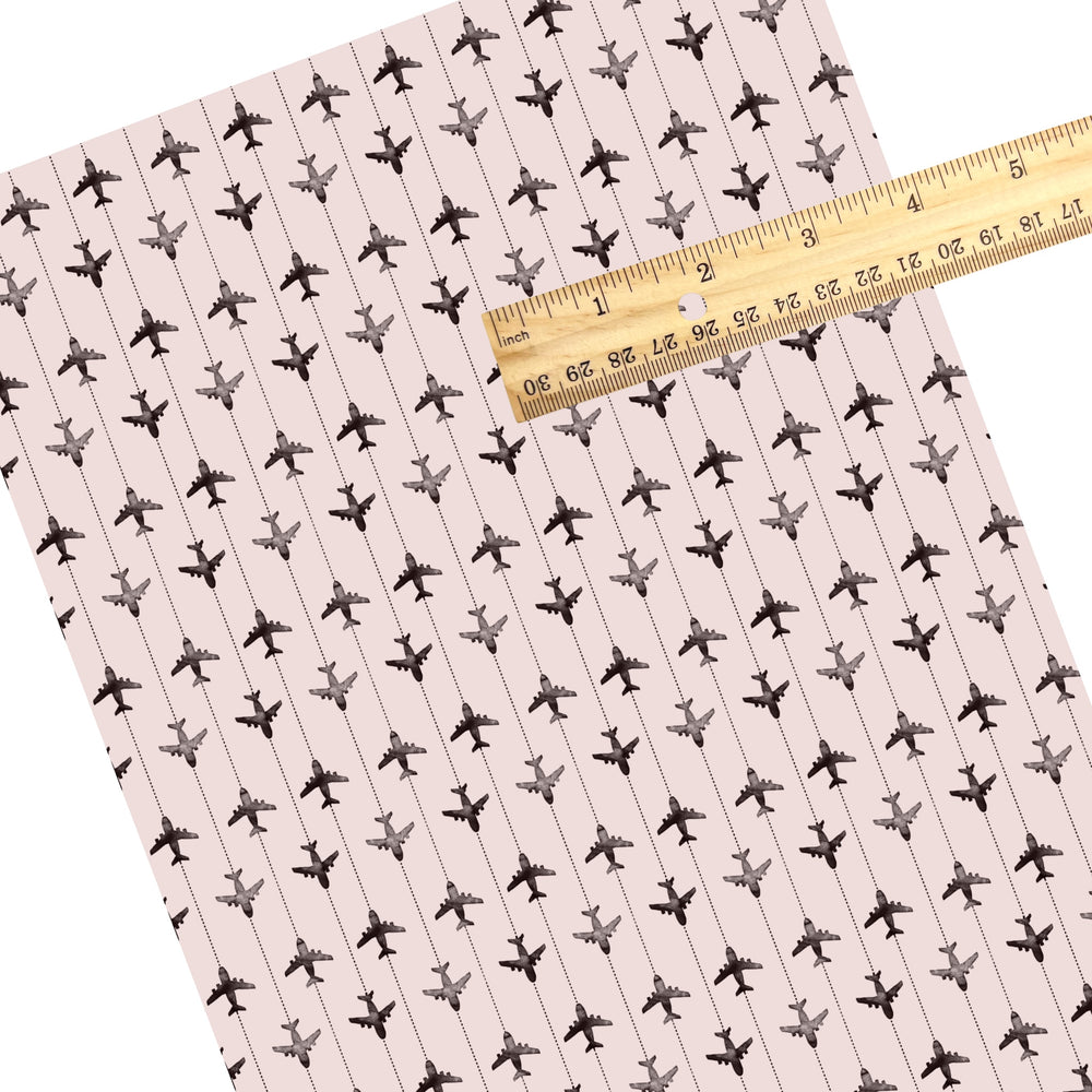 These travel themed faux leather sheets contain the following design elements: airplanes on grey pattern. Our CPSIA compliant faux leather sheets or rolls can be used for all types of crafting projects.