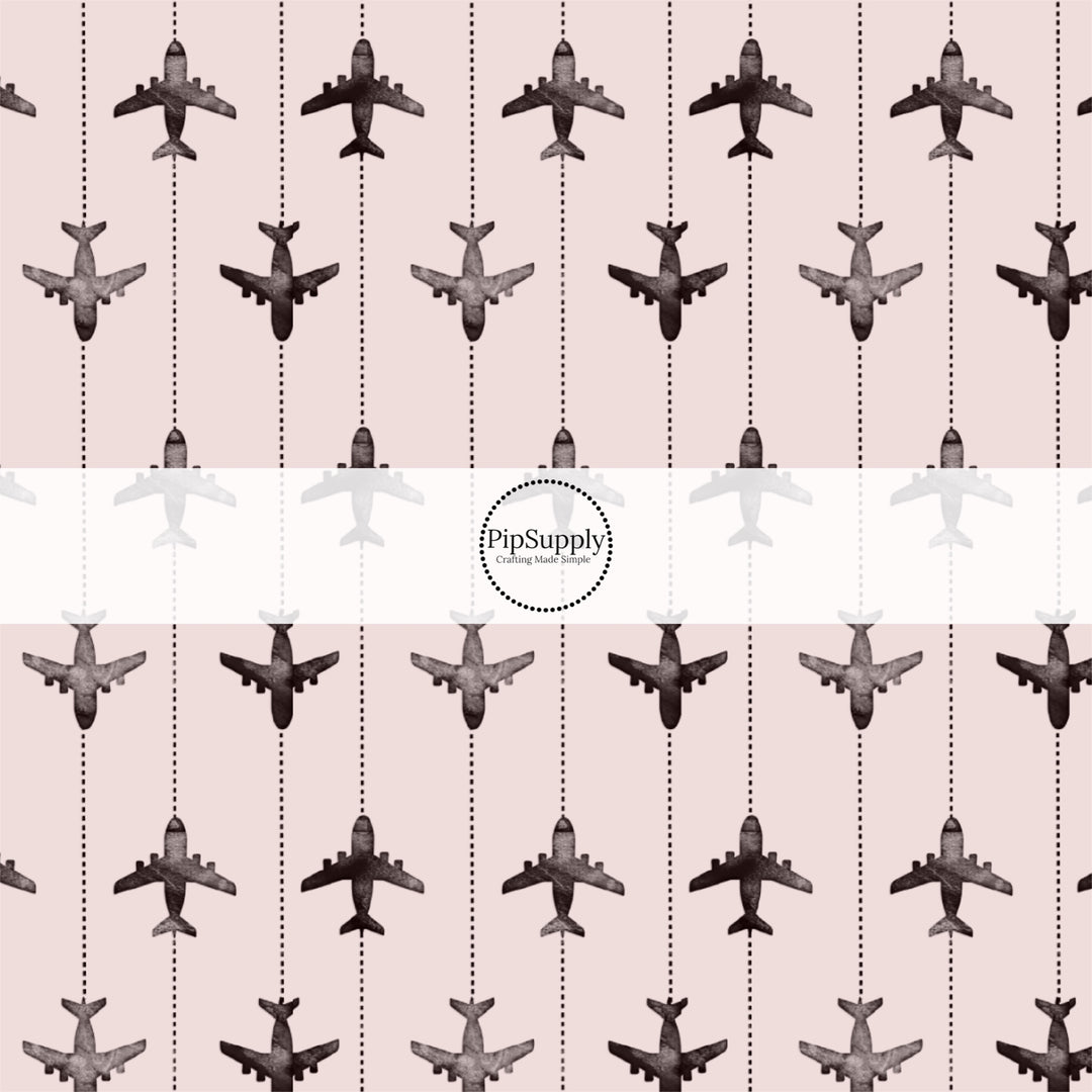 These travel themed no sew bow strips can be easily tied and attached to a clip for a finished hair bow. These bow strips are great for personal use or to sell. These bow strips feature the following design elements: airplanes on grey pattern.