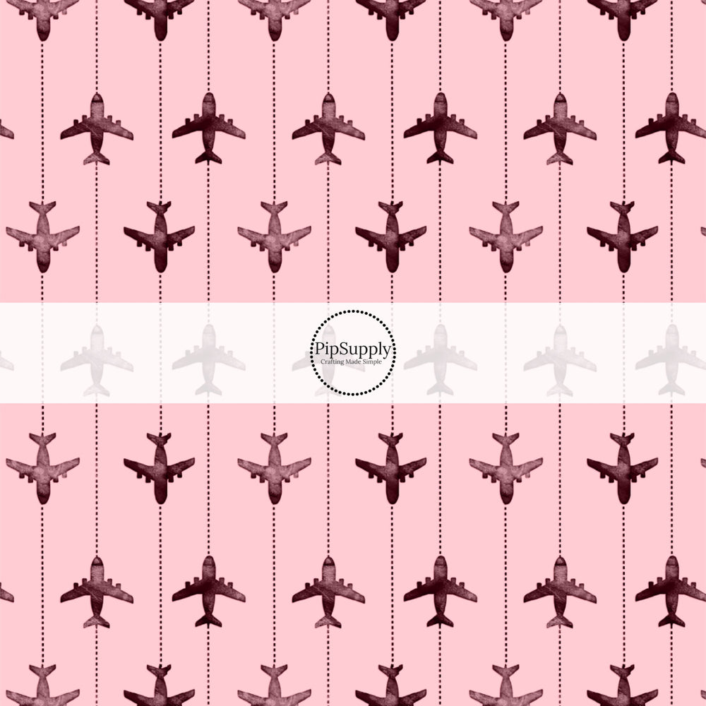 These travel themed no sew bow strips can be easily tied and attached to a clip for a finished hair bow. These bow strips are great for personal use or to sell. These bow strips feature the following design elements: airplanes on pink pattern.