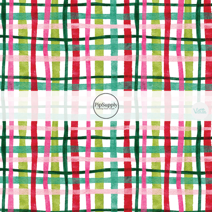 These winter plaid themed pattern fabric by the yard features the following design elements: colorful Christmas plaid. This fun themed fabric can be used for all your sewing and crafting needs!