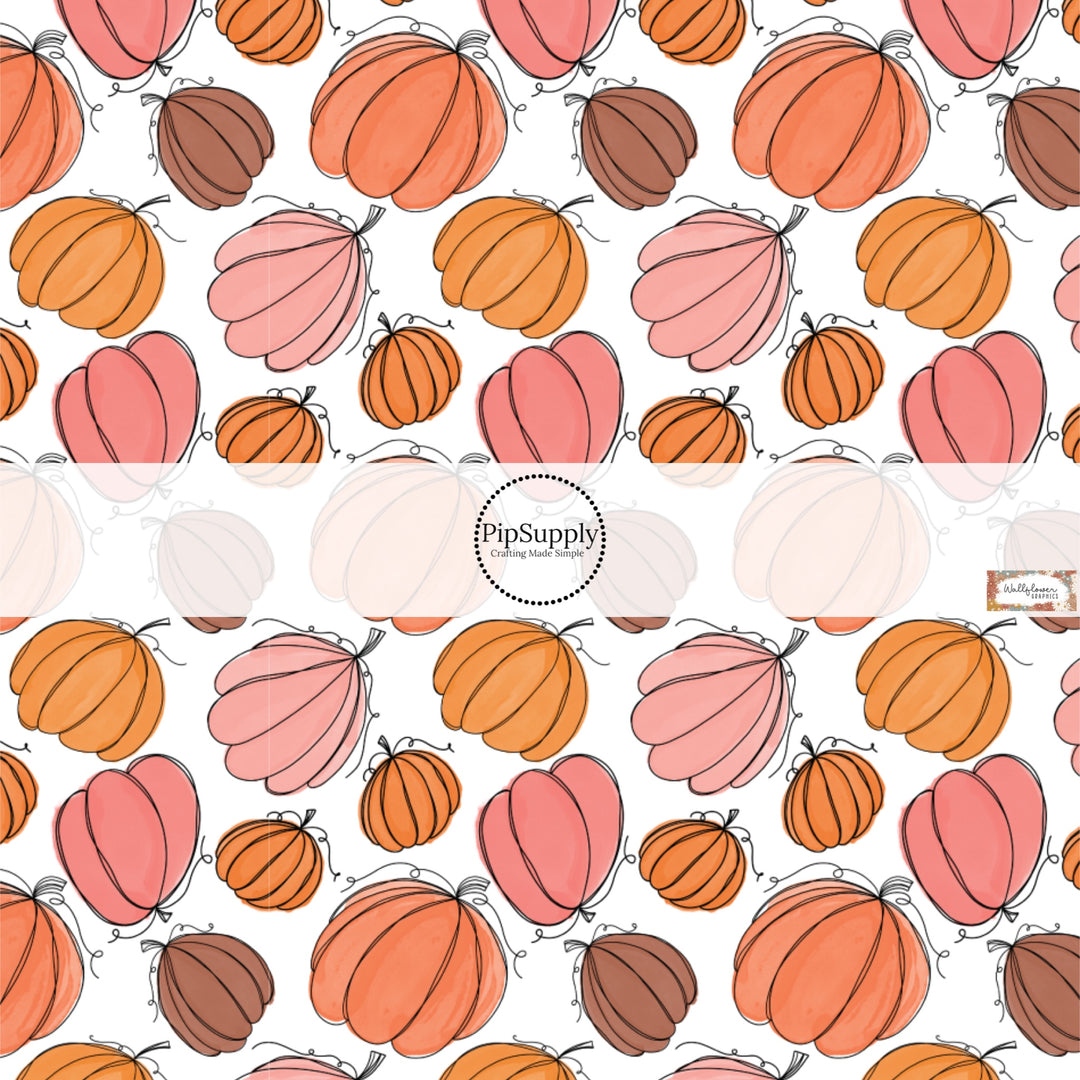 These fall themed pattern fabric by the yard features the following design elements: multi color pumpkins on white. This fun themed fabric can be used for all your sewing and crafting needs!