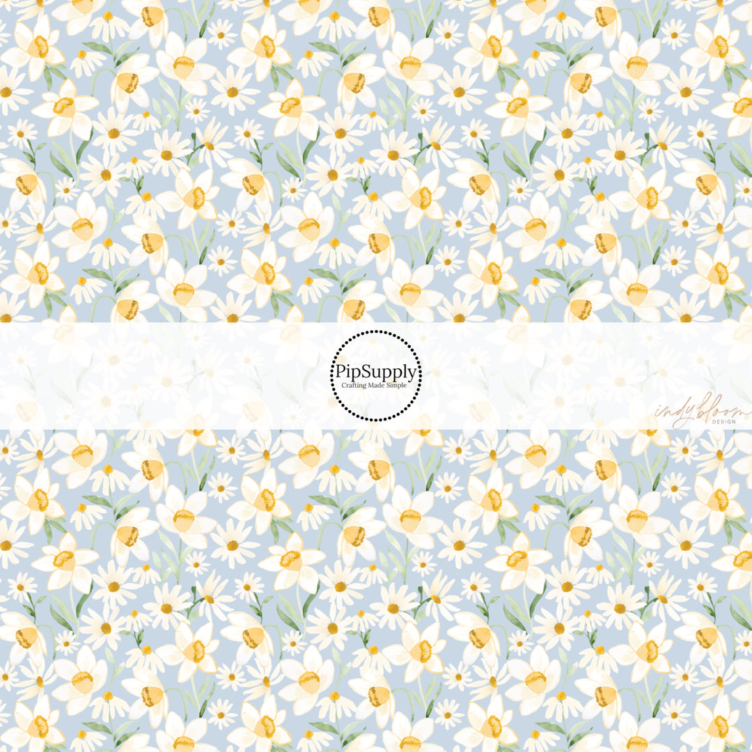 These spring fabric by the yard features watercolor blue floral patterns. This fun pattern fabric can be used for all your sewing and crafting needs!