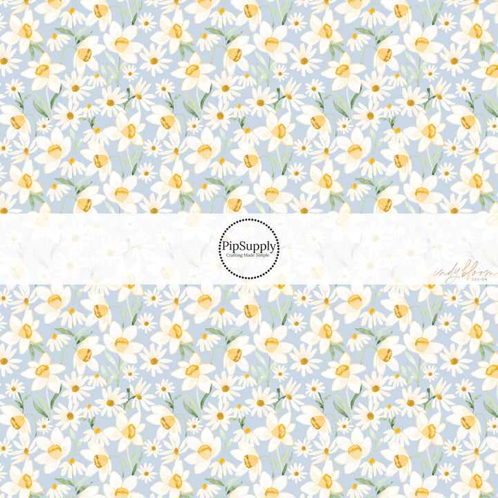 These spring fabric by the yard features watercolor blue floral patterns. This fun pattern fabric can be used for all your sewing and crafting needs!