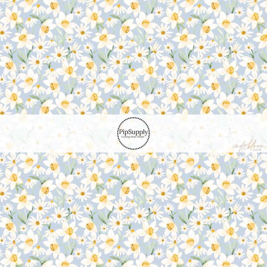 These spring fabric by the yard features watercolor blue floral patterns. This fun pattern fabric can be used for all your sewing and crafting needs!