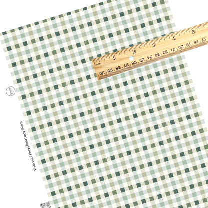 These St. Patrick's pattern themed faux leather sheets contain the following design elements: green and cream plaid pattern. Our CPSIA compliant faux leather sheets or rolls can be used for all types of crafting projects.