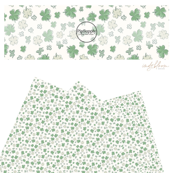 These St. Patrick's pattern themed faux leather sheets contain the following design elements: green and light green shamrocks on cream. Our CPSIA compliant faux leather sheets or rolls can be used for all types of crafting projects.