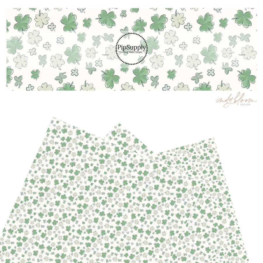 These St. Patrick's pattern themed faux leather sheets contain the following design elements: green and light green shamrocks on cream. Our CPSIA compliant faux leather sheets or rolls can be used for all types of crafting projects.