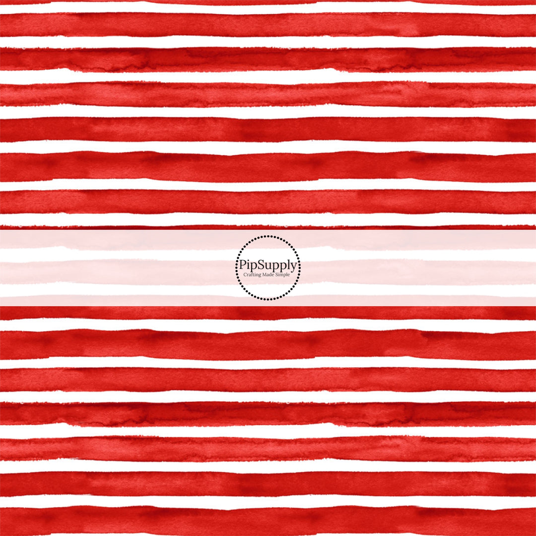 These patriotic fabric by the yard features red stripes. This fun pattern fabric can be used for all your sewing and crafting needs!