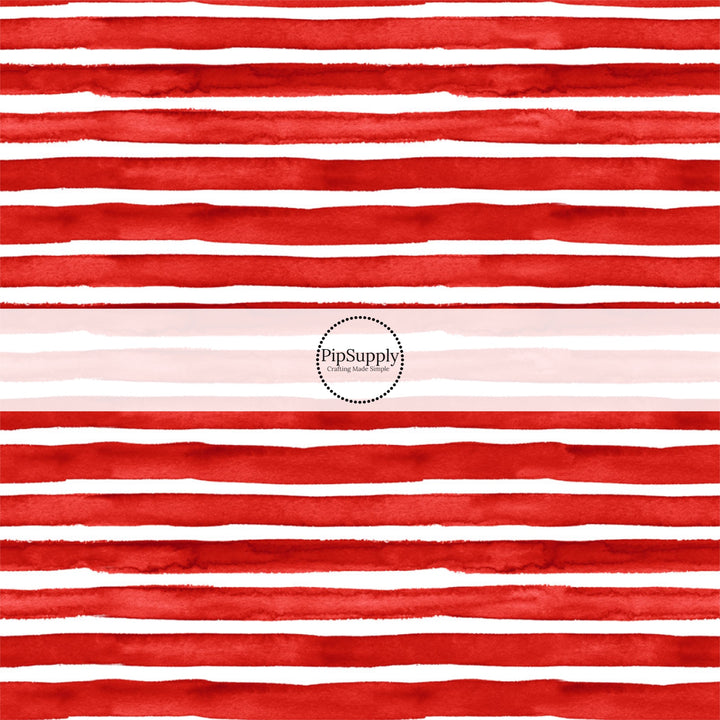 These patriotic fabric by the yard features red stripes. This fun pattern fabric can be used for all your sewing and crafting needs!