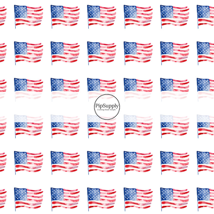 These patriotic fabric by the yard features watercolor American flags. This fun pattern fabric can be used for all your sewing and crafting needs!