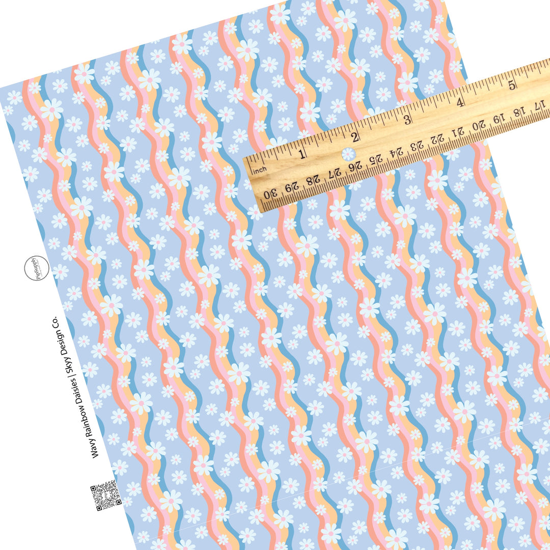 Wavy pastel rainbow stripes with white daisies with various sizes on periwinkle faux leather sheets. 