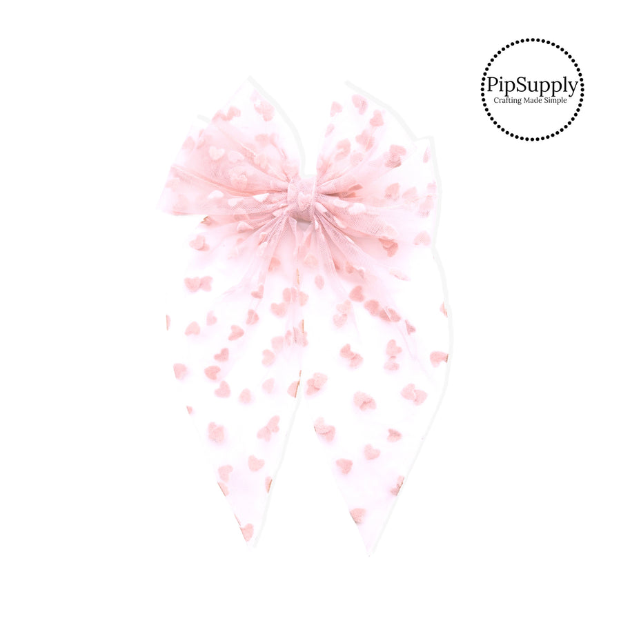 These heart tulle pre-cut tied bows are ready to package and resell to your customers no sewing or measuring necessary! These hair bows come with a alligator clip already attached.