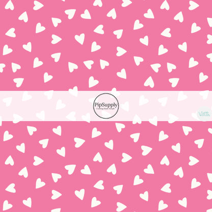 Scattered little cream hearts on pink hair bow strips
