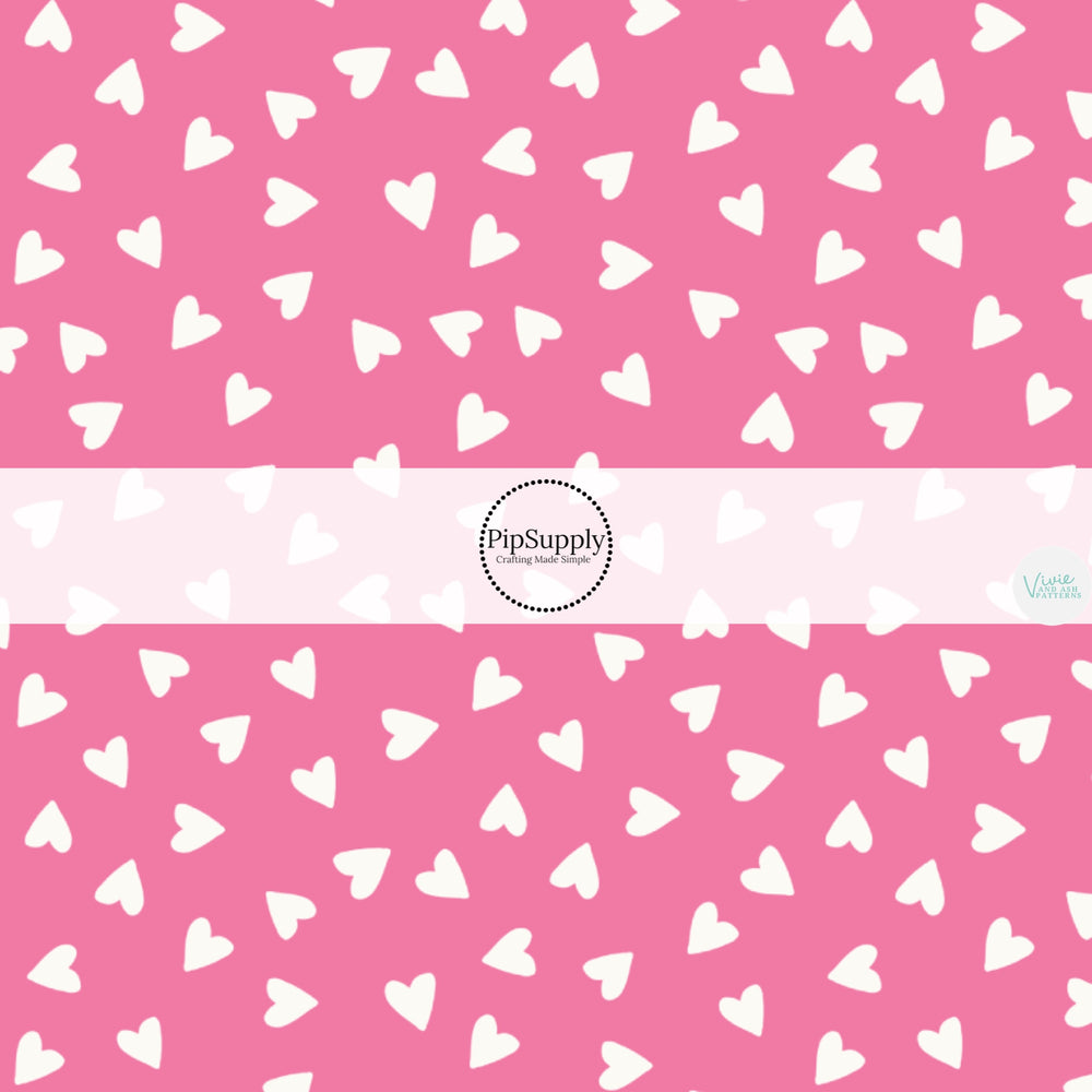 Scattered little cream hearts on pink hair bow strips