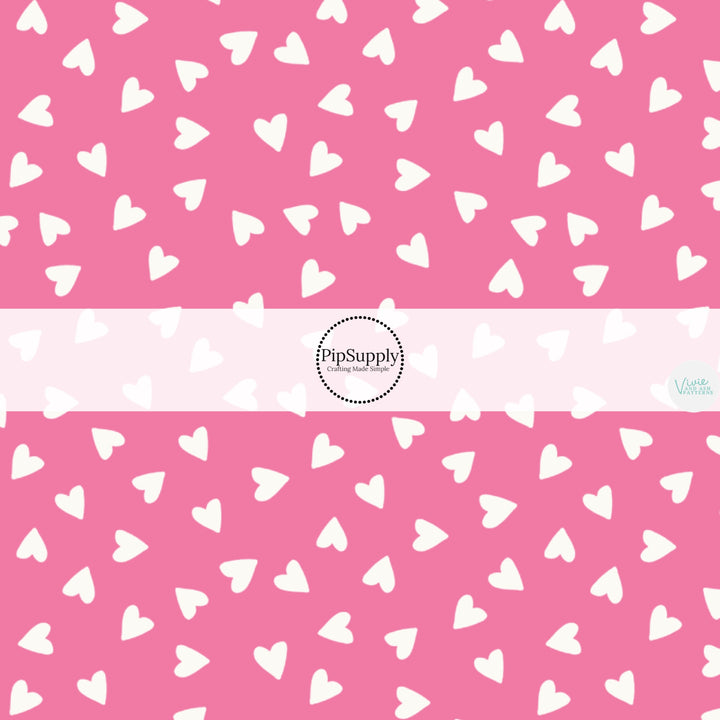 Scattered little cream hearts on pink hair bow strips