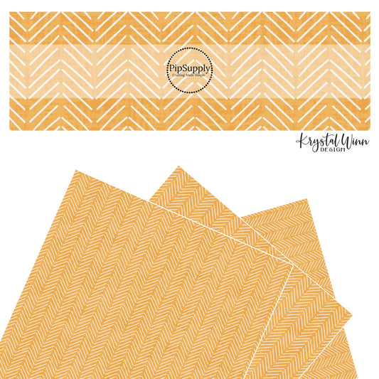 These mustard colored faux leather sheets contain the following design elements: white arrows on light orange.