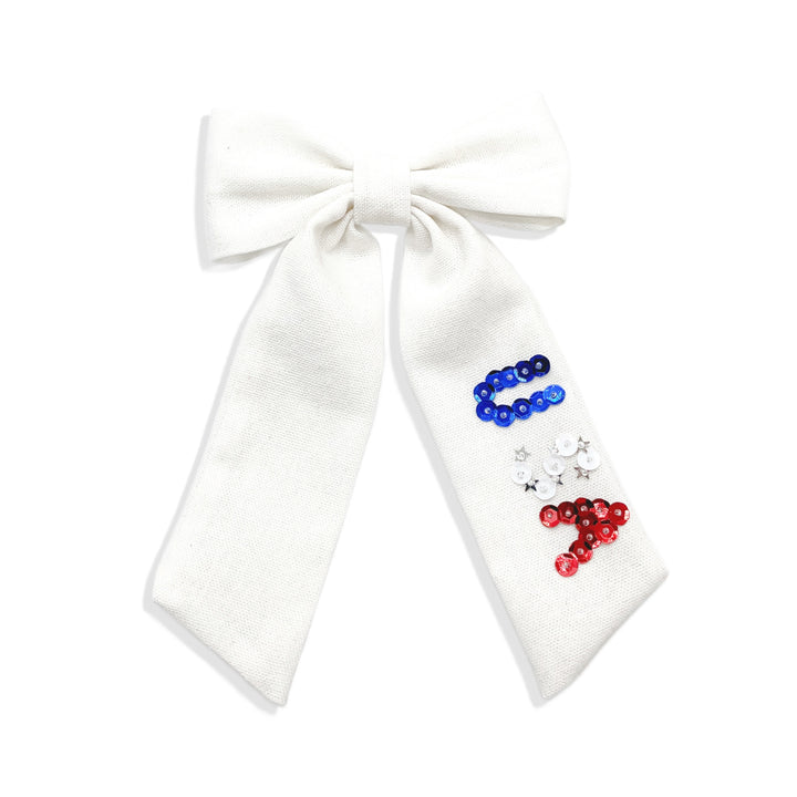 These patriotic linen pre-cut tied bows are ready to package and resell to your customers no sewing or measuring necessary! These hair bows come with a clip already attached. The linen bow has "USA" sequins.