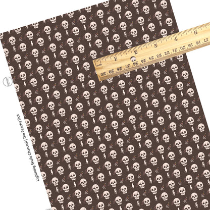 Lightning stars and skulls on gray faux leather sheet
