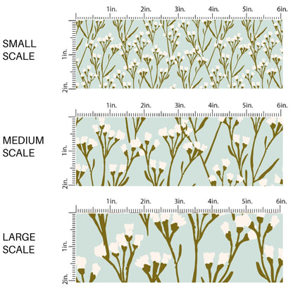 This scale chart of small scale, medium scale, and large scale of this summer fabric by the yard features cream wildflowers on light blue. This fun summer themed fabric can be used for all your sewing and crafting needs!