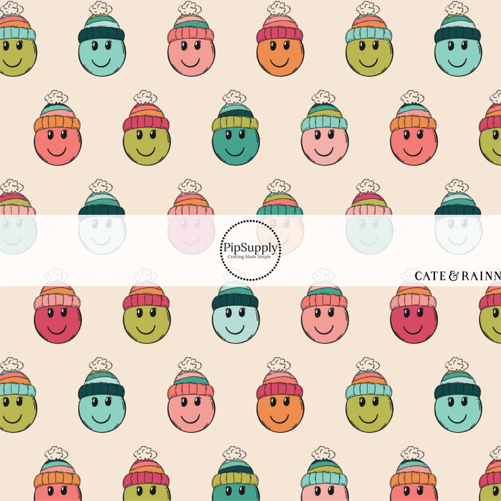 These winter smiley faces themed pattern fabric by the yard features the following design elements: colorful smiley faces with hats on cream. This fun themed fabric can be used for all your sewing and crafting needs!