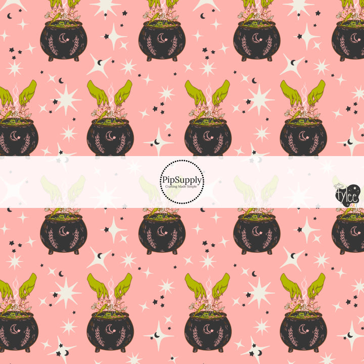 These Halloween themed pattern fabric by the yard features the following design elements: witches cauldrons on light pink. This fun spooky themed fabric can be used for all your sewing and crafting needs!