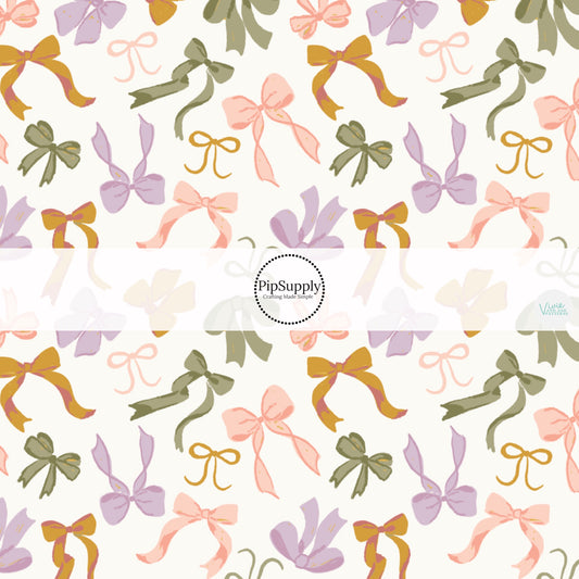 This summer fabric by the yard features woodsy cutesy bows on cream. This fun themed fabric can be used for all your sewing and crafting needs!