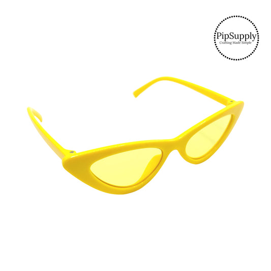 Yellow lenses on solid yellow sunglasses