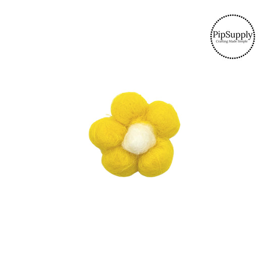 Yellow flower with white center felt embellishment