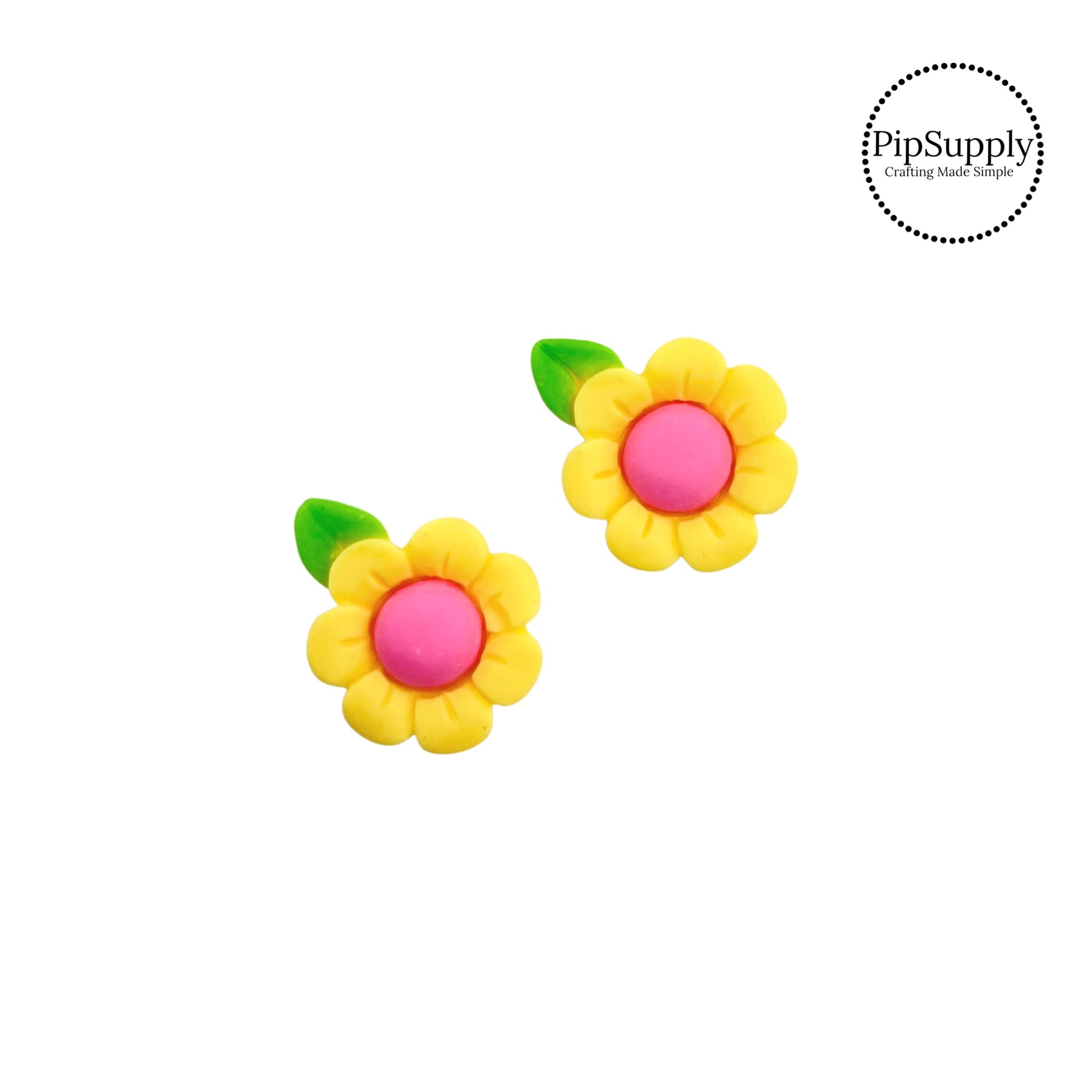 Green leaves on yellow sunflower with pink center flat back resin embellishment