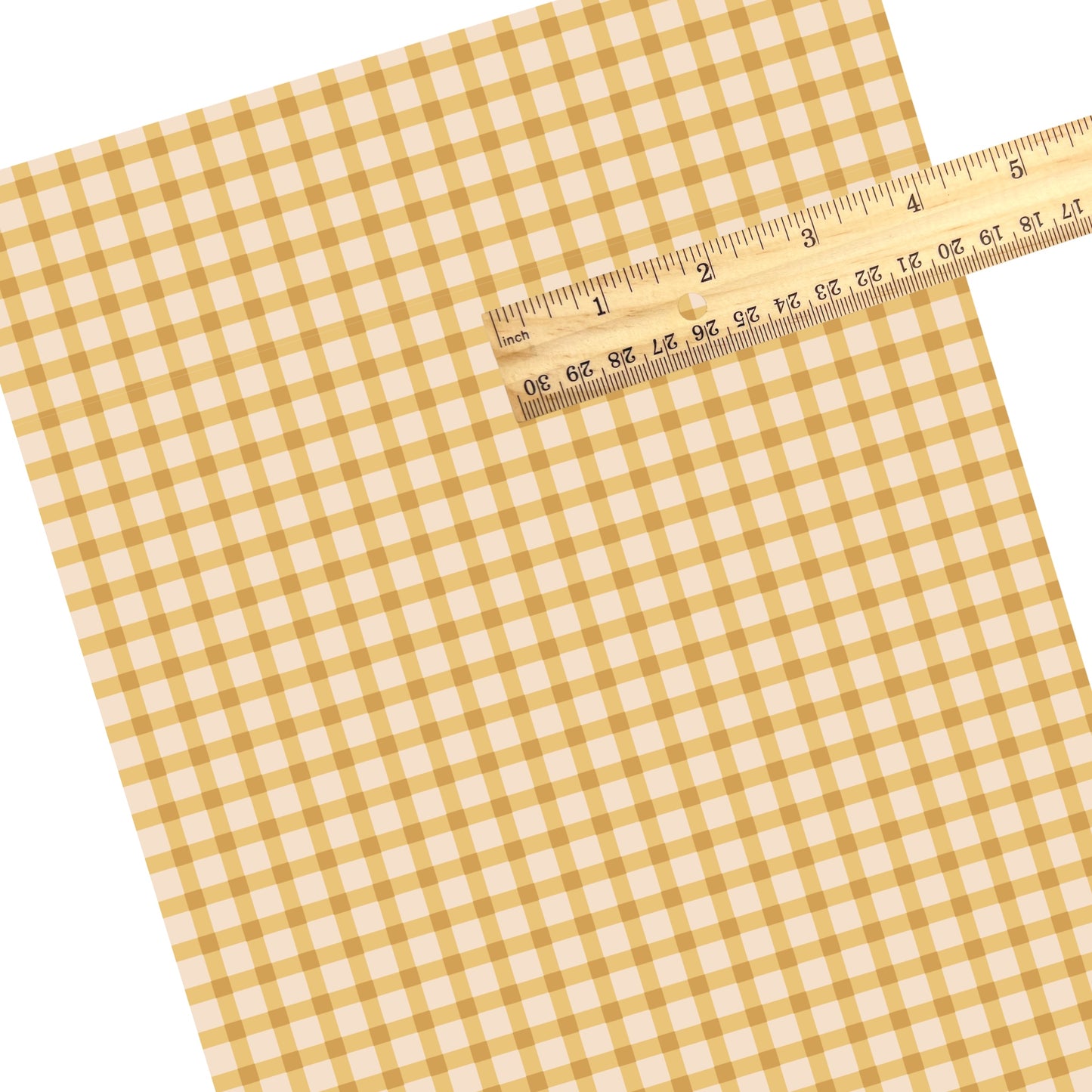 These summer faux leather sheets contain the following design elements: summer haze yellow and cream plaid pattern. Our CPSIA compliant faux leather sheets or rolls can be used for all types of crafting projects.