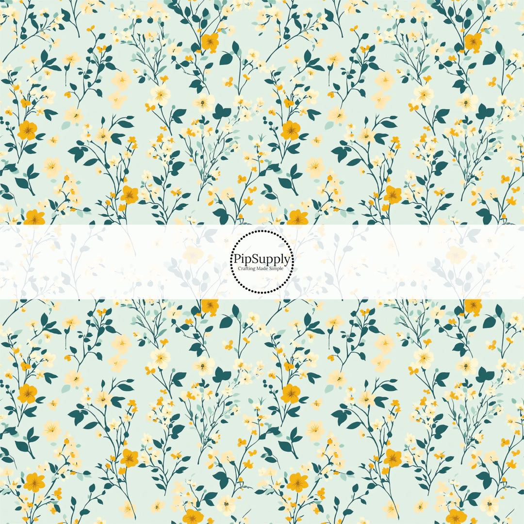 These floral fabric by the yard features tiny blue and yellow flowers and leaves on teal. This fun pattern fabric can be used for all your sewing and crafting needs!