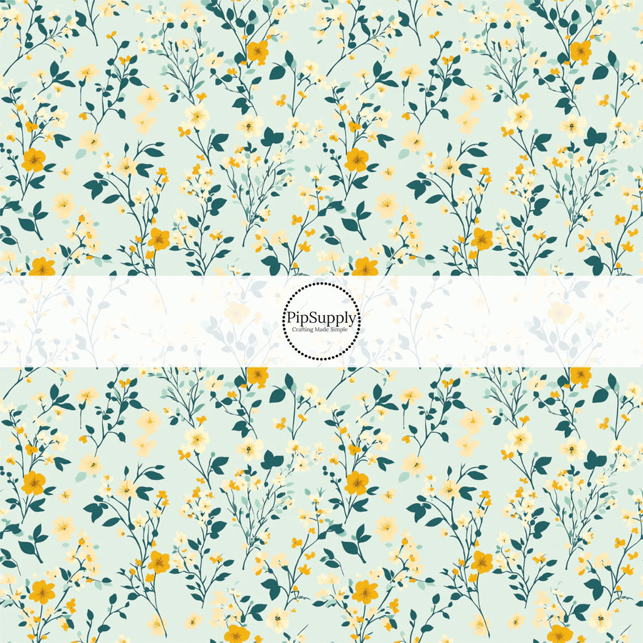 These floral fabric by the yard features tiny blue and yellow flowers and leaves on teal. This fun pattern fabric can be used for all your sewing and crafting needs!