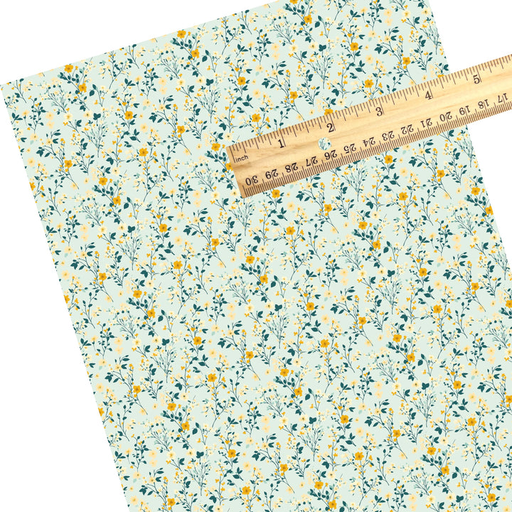 These floral themed faux leather sheets contain the following design elements: tiny blue and yellow flowers and leaves on teal. Our CPSIA compliant faux leather sheets or rolls can be used for all types of crafting projects.