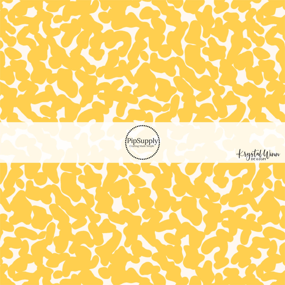 Scattered yellow and cream composition book bow strips