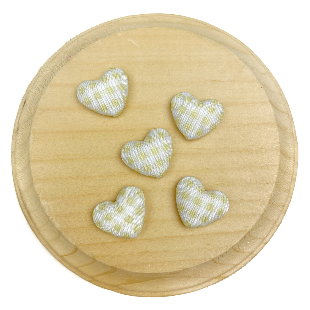Heart-shaped flat back embellishment featuring a yellow and white gingham plaid pattern with a softly padded, fabric-covered appearance. Finished with smooth edges and a charming, classic design, perfect for bows, hair accessories, scrapbooking, and craft projects.

Silver, flat backing
Sets of 10
Approx 1.9cm l x 1.58cm 