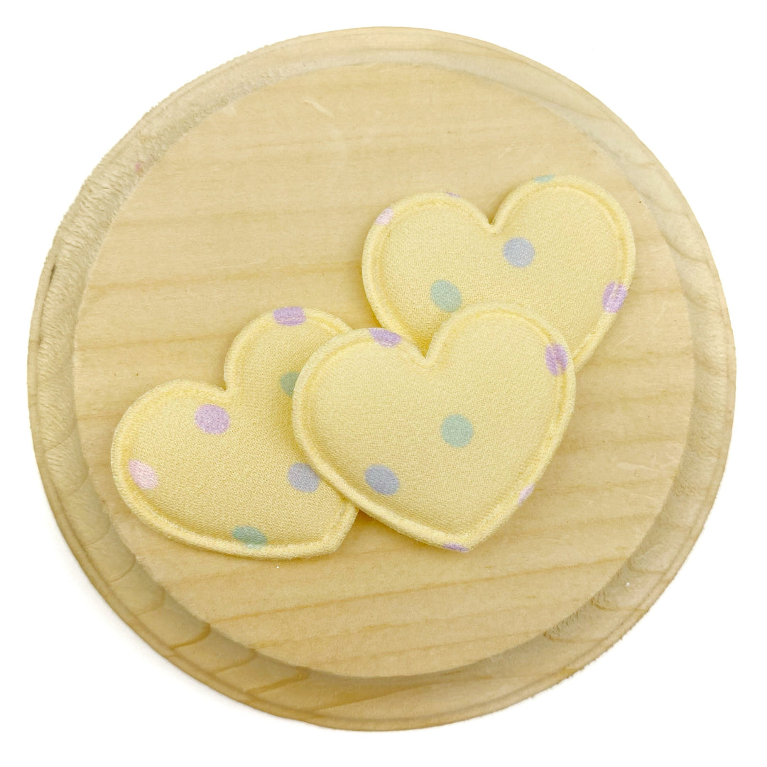 Soft yellow fabric heart embellishments with pastel polka dots in lavender, mint green, and light blue, featuring a lightly padded design and stitched edges for a sweet, dimensional look.
Heart Appliques
Sets of 3
Approx ;35 mm x 25 mm