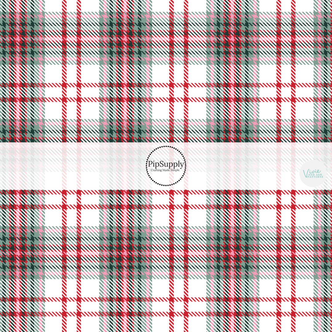 These winter yuletide plaid themed pattern fabric by the yard features the following design elements: Christmas red and green plaid pattern. This fun themed fabric can be used for all your sewing and crafting needs!