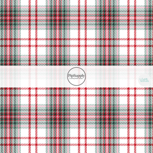 These winter yuletide plaid themed pattern fabric by the yard features the following design elements: Christmas red and green plaid pattern. This fun themed fabric can be used for all your sewing and crafting needs!