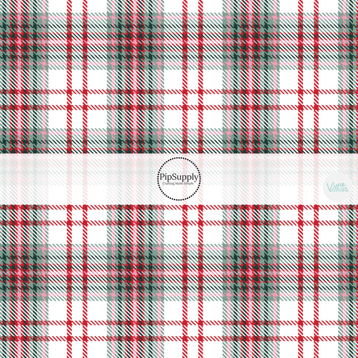 These winter yuletide plaid themed pattern fabric by the yard features the following design elements: Christmas red and green plaid pattern. This fun themed fabric can be used for all your sewing and crafting needs!