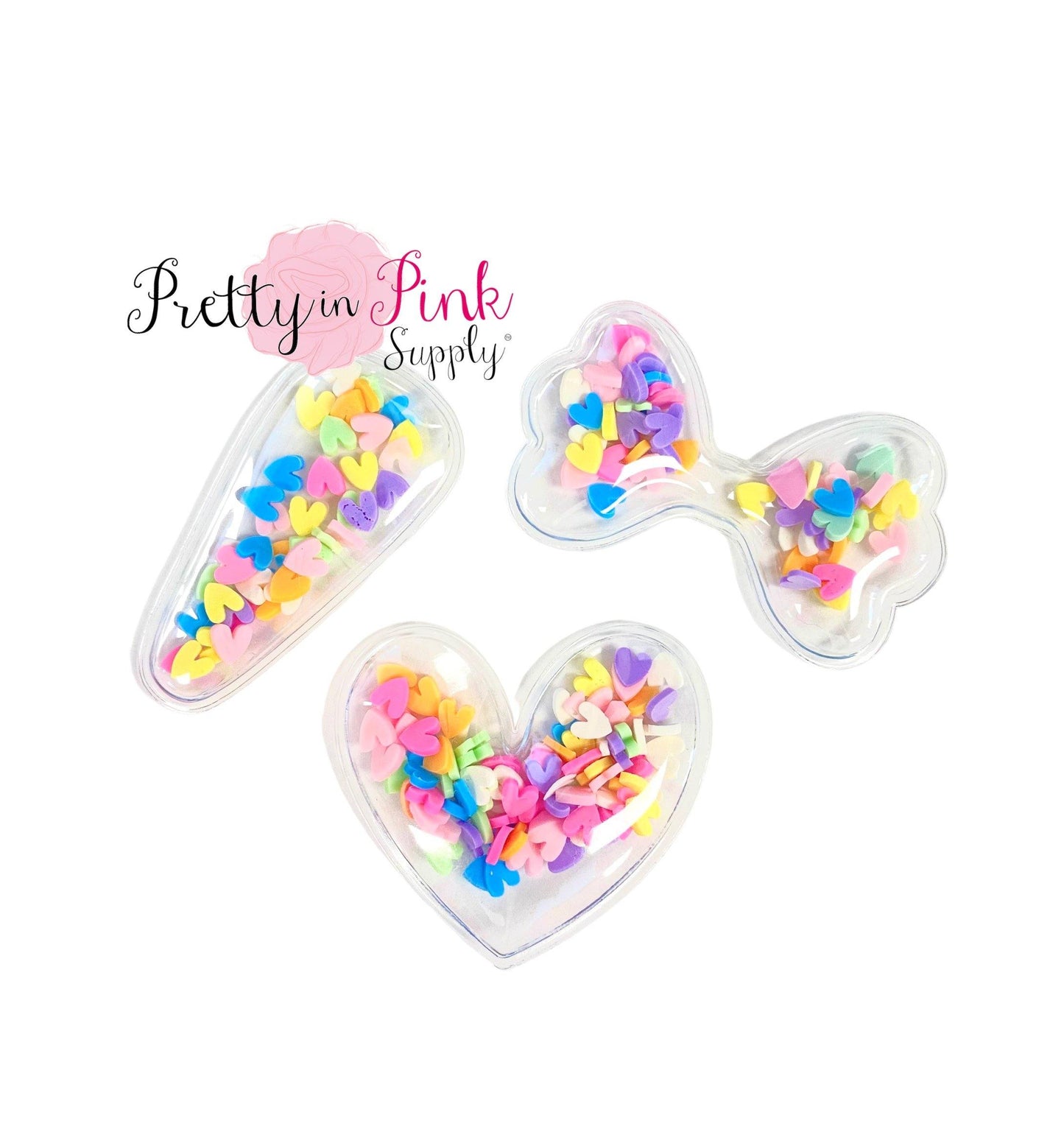 Pastel rainbow hearts clay slices filled shakers in heart shape, bow shape, and clip cover shape.