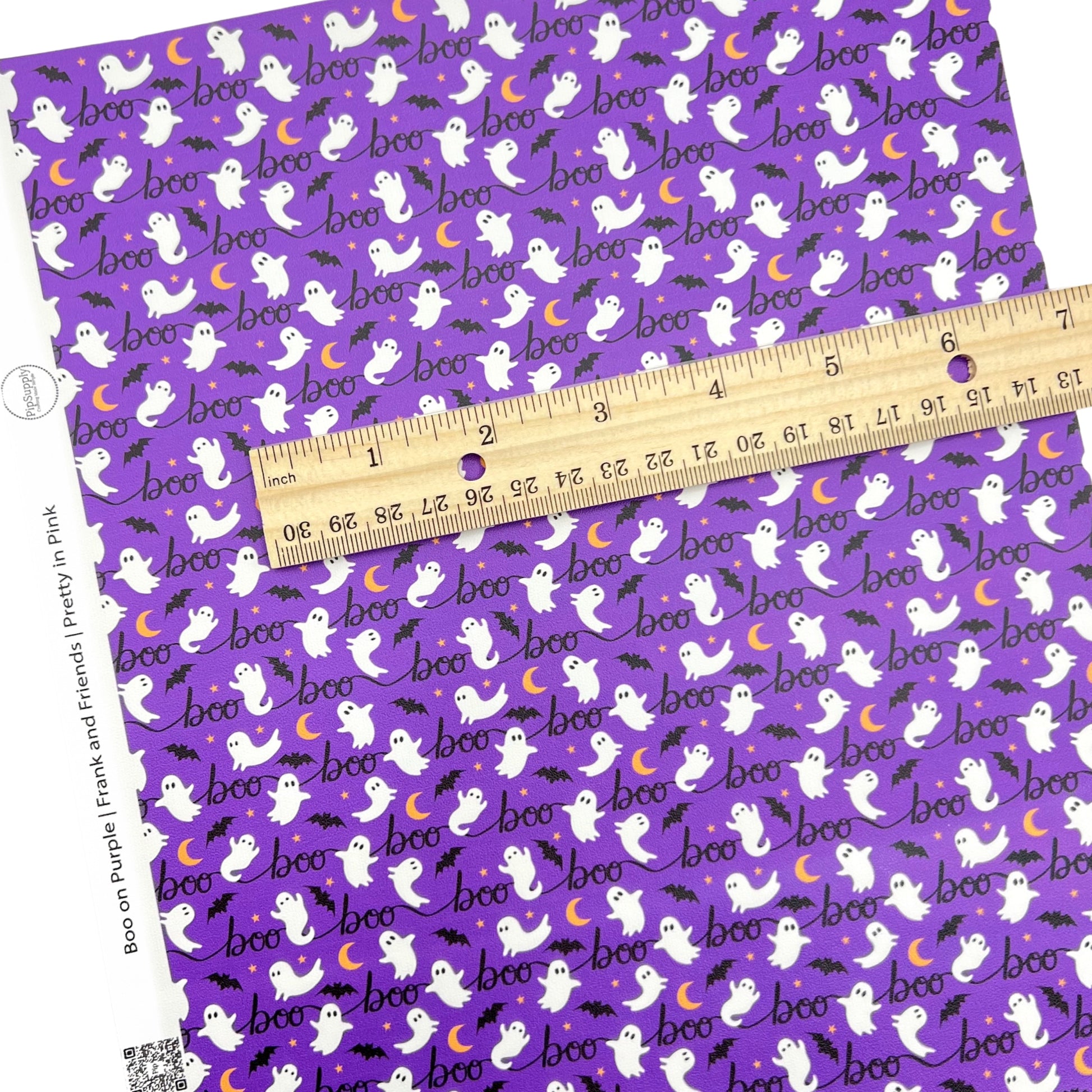 Rolled and individual purple faux leather sheet wth ghosts bats and moons halloween